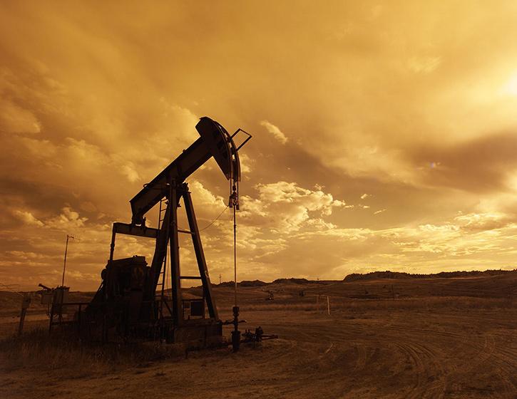 oil-pump-jack-sunset-clouds-silhouette-162568.jpg